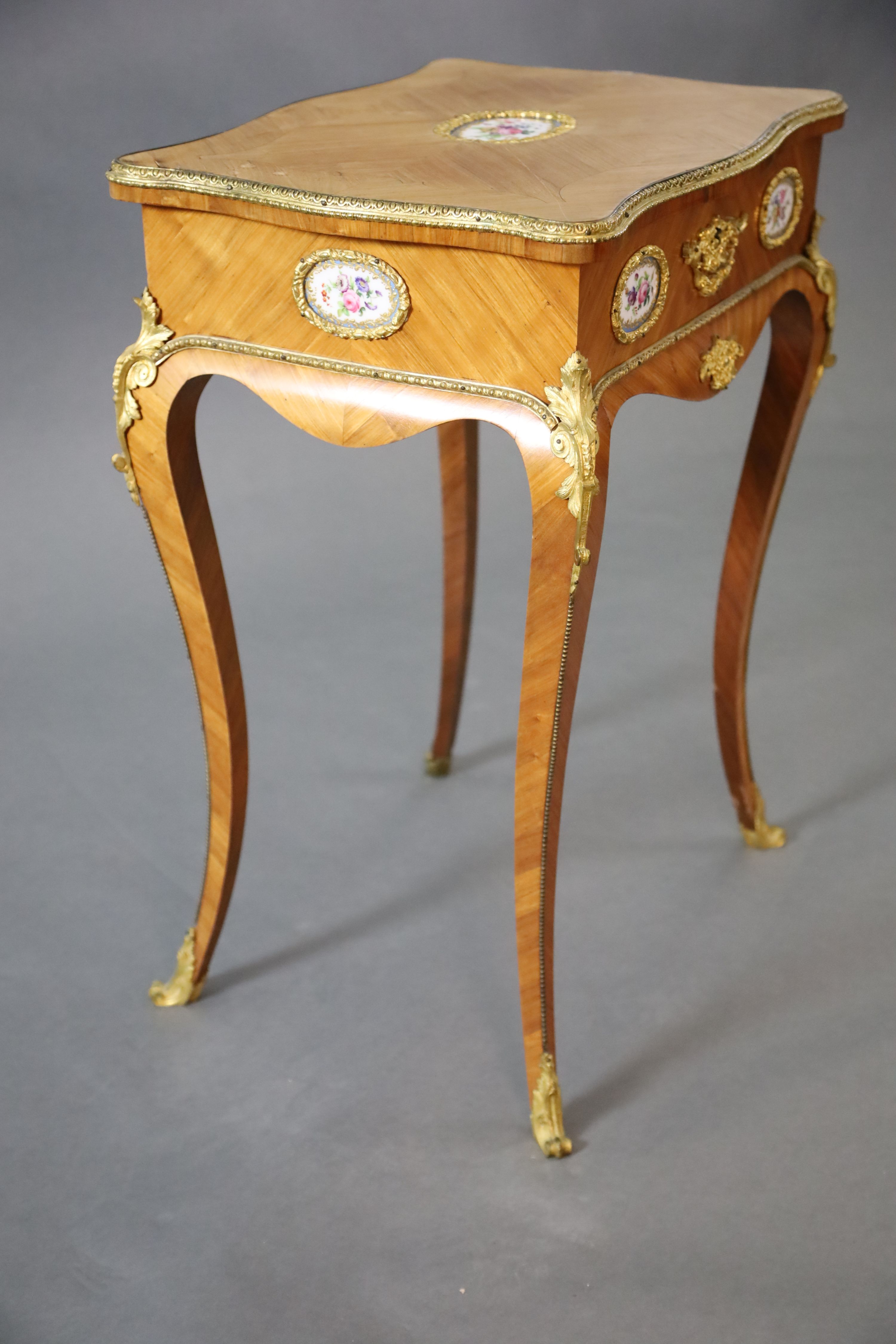 A late 19th century French Louis XV style ormolu kingwood work table, W.1ft 8in. D.1ft 2.5in. H.2ft 3in.